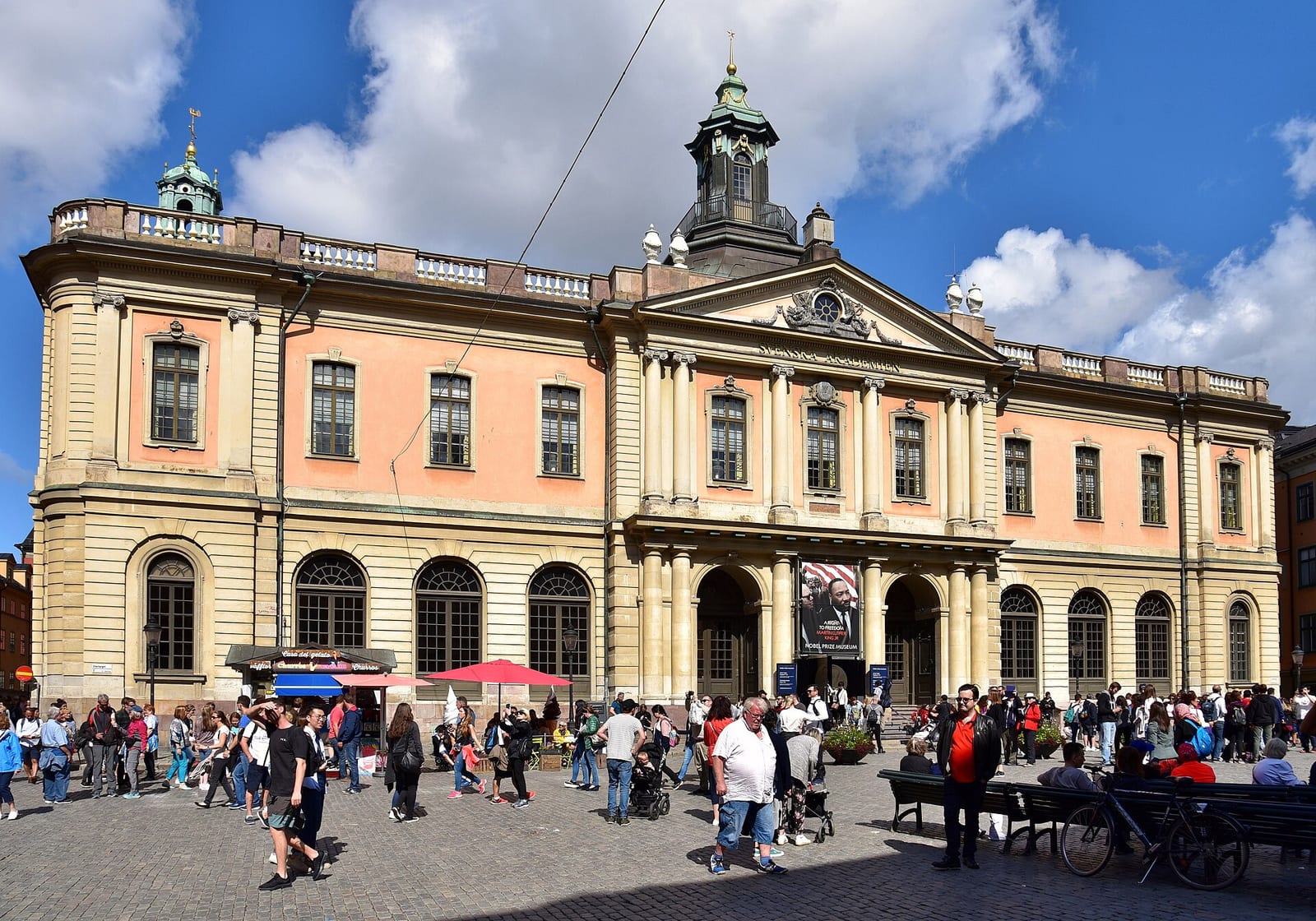 Börshuset, the former Stockholm Stock Exchange building in Gamla Stan, with people gathered in the square outside