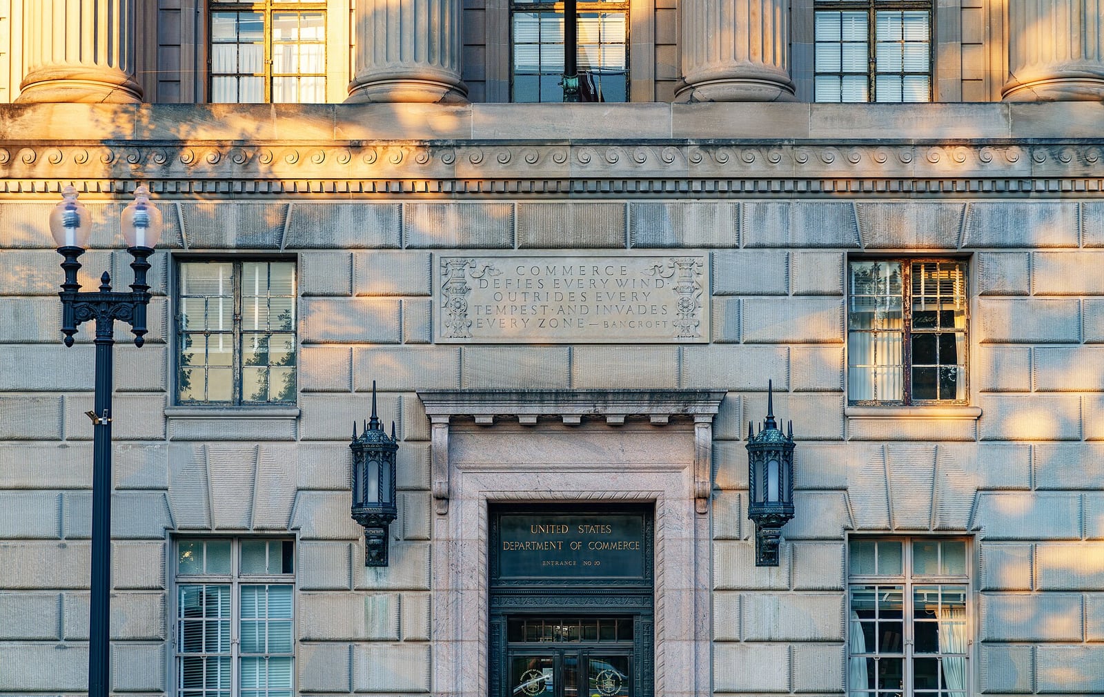 The entrance of the Herbert C. Hoover Building, headquarters of the United States Department of Commerce in Washington DC