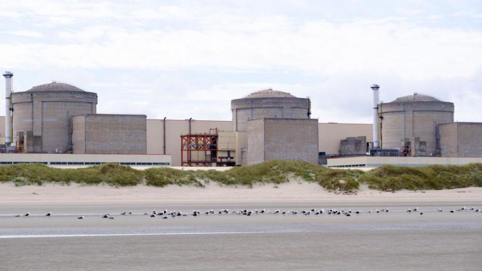 The Gravelines nuclear power station seen from across water