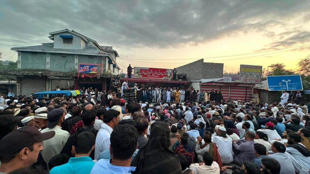 A large sit-in protest gathered in a town square