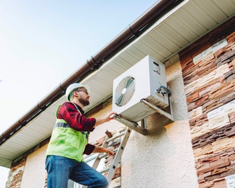 A domestic heat pump unit installed outside a house