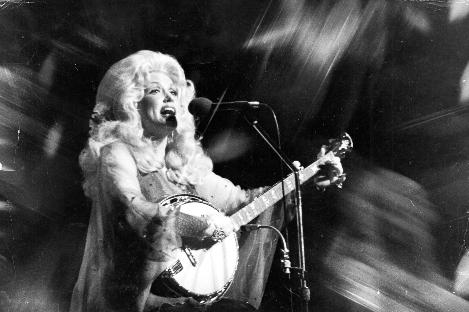 Dolly Parton performing on stage in 1970